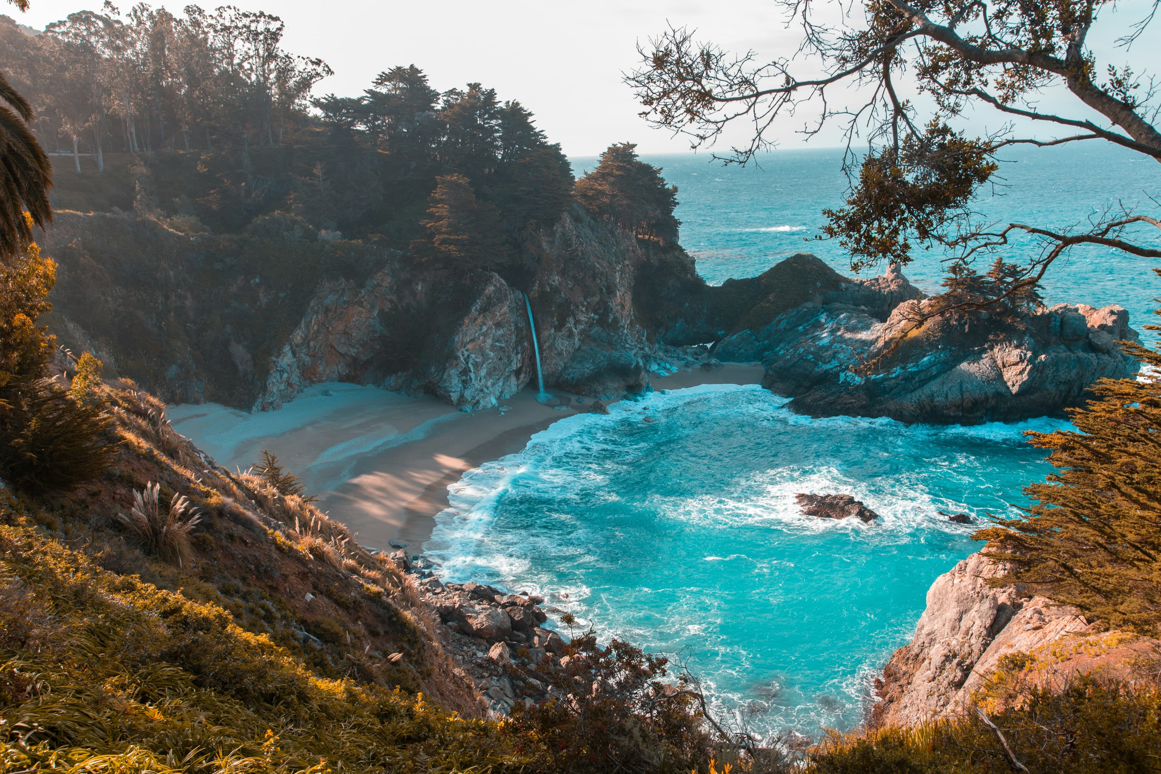 Clear tropical shoreline and soft sand for a private beach escape