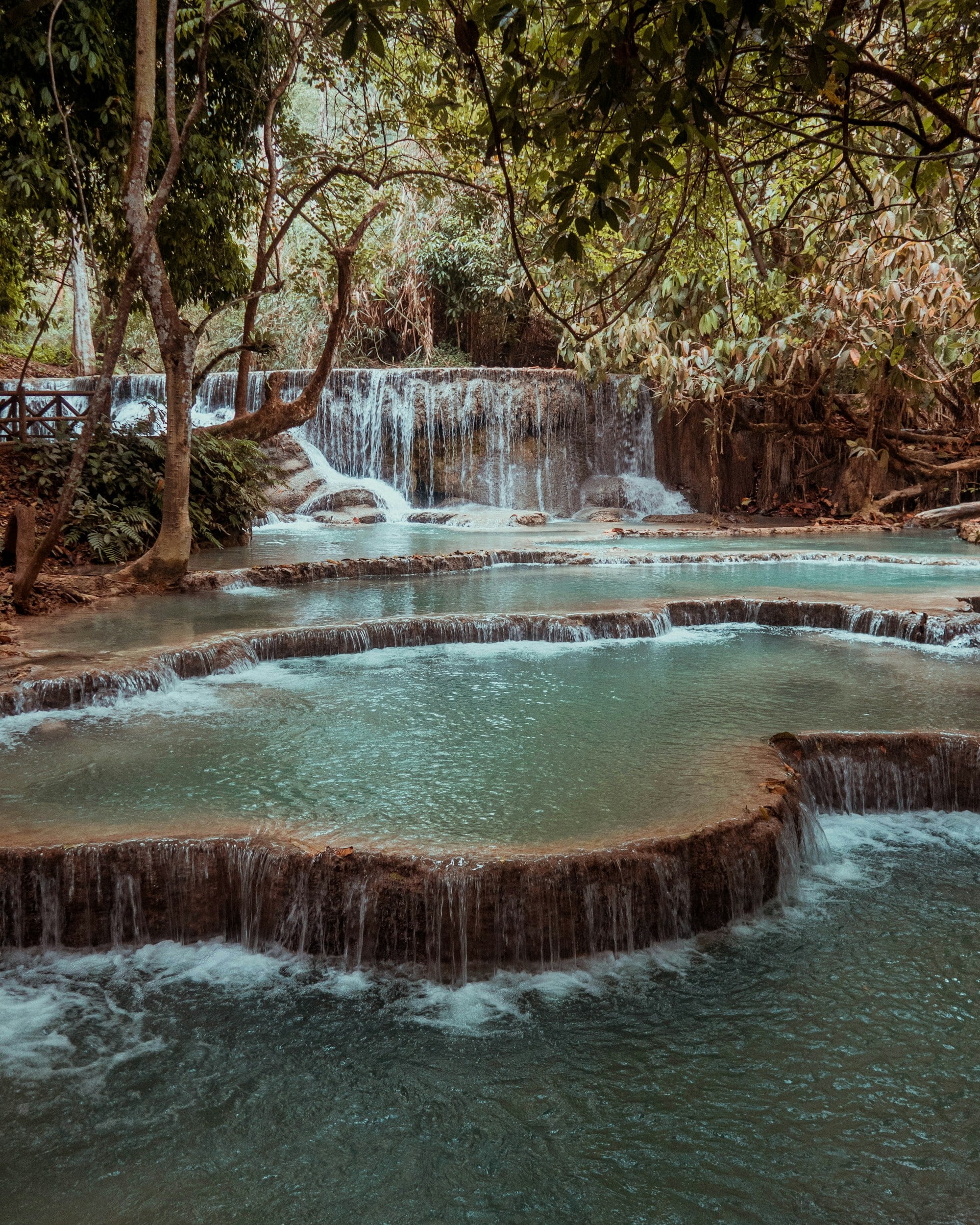 Turquoise Kuang Si waterfall pools near Luang Prabang, Laos